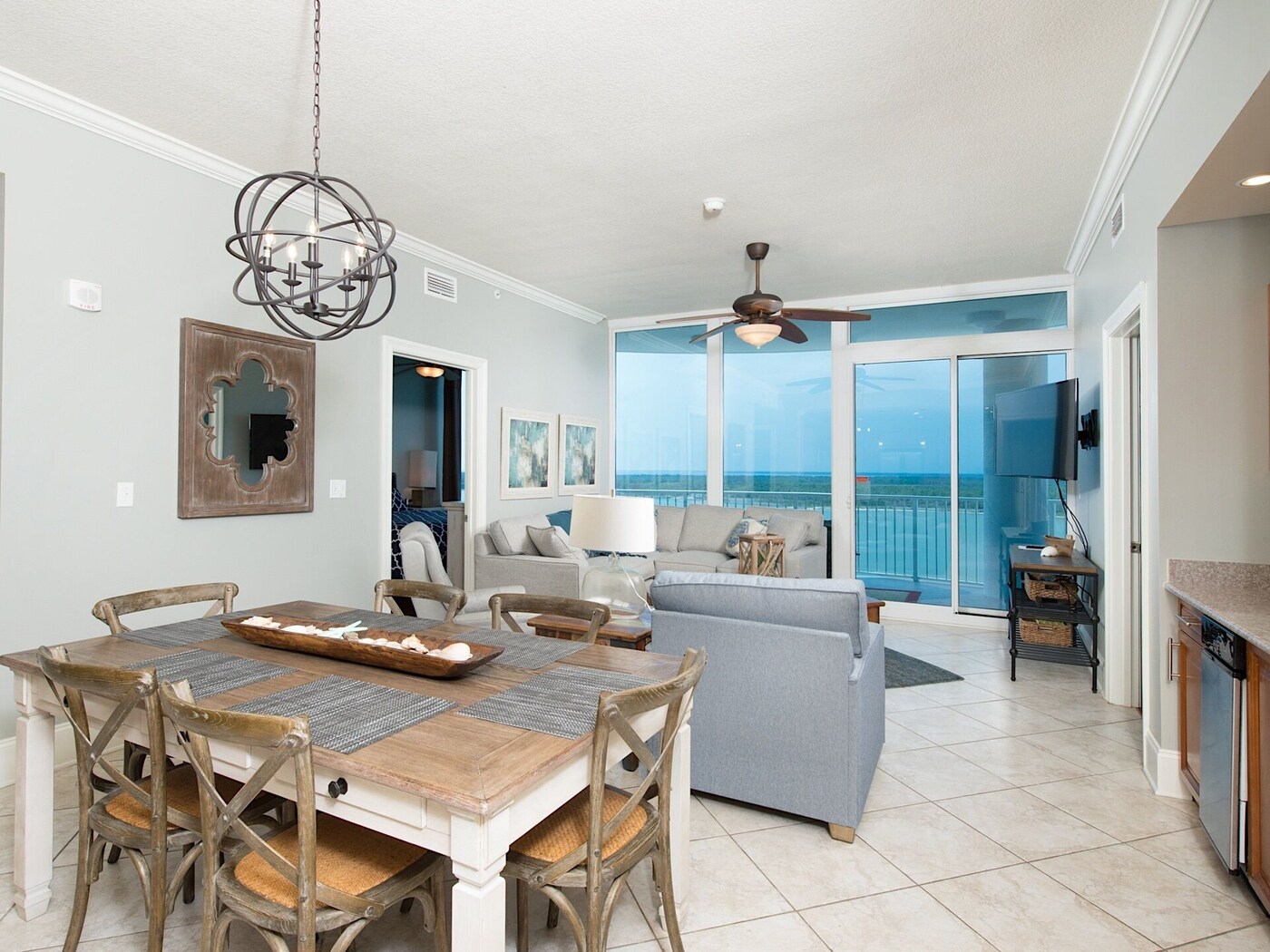 Bel Sole Unit 1502 living area with floor-to-ceiling waterfront views